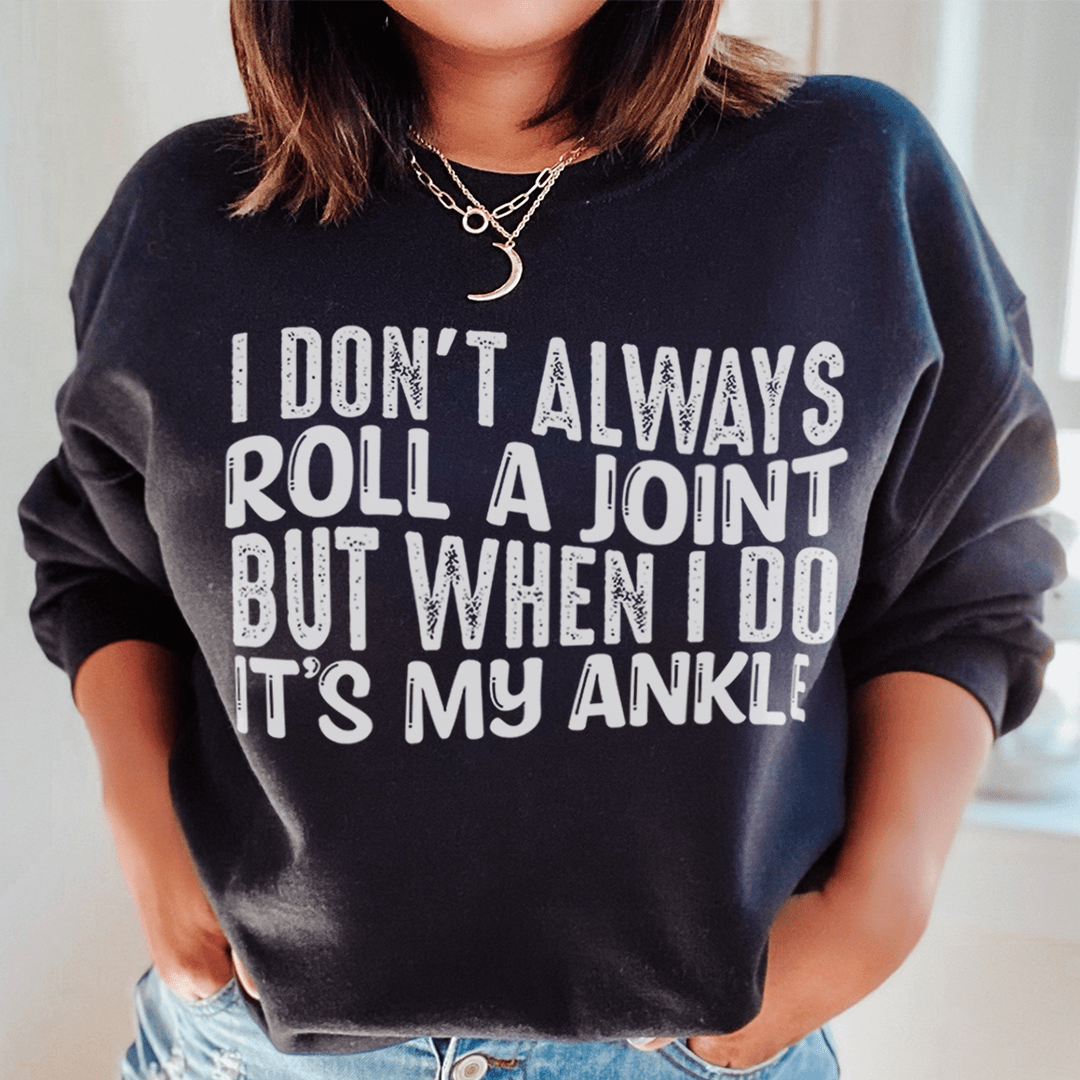 A cozy hoodie featuring the humorous phrase 'I Don't Always Roll A Joint But When I Do It's My Ankle', made from soft cotton/poly fleece blend.