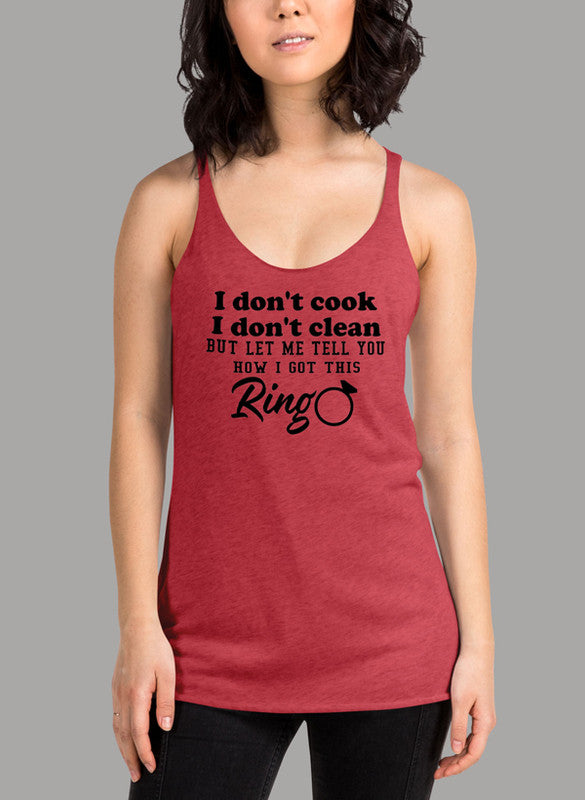 Black women's tank top with 'I Don't Cook, I Don't Clean' text, featuring a racer back style and curved hem.