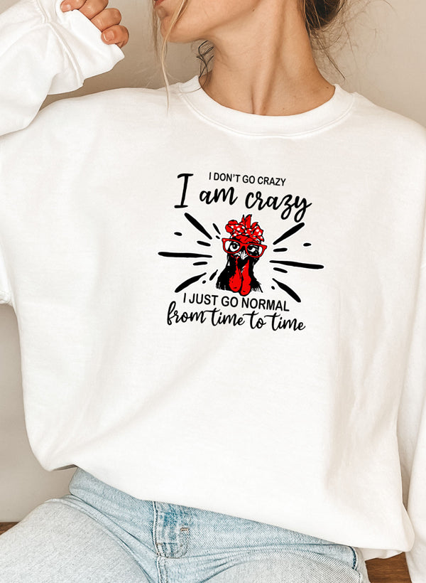 A cozy cotton/poly fleece sweatshirt featuring the phrase 'I Don't Go Crazy, I Am Crazy, I Just Go Normal From Time To Time' in a stylish design.