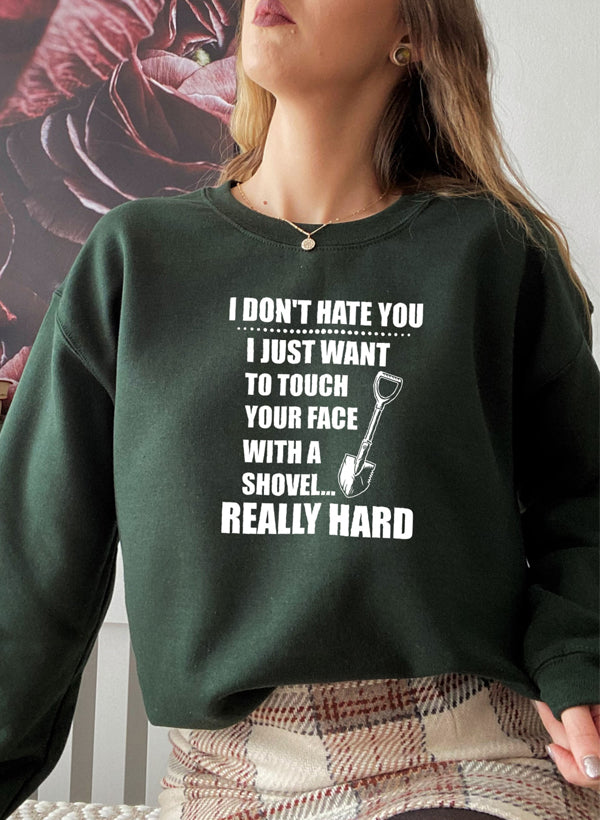 I Don't Hate You Sweat Shirt featuring a unique artistic design, cozy fleece lining, and adjustable cuffs for a perfect fit.