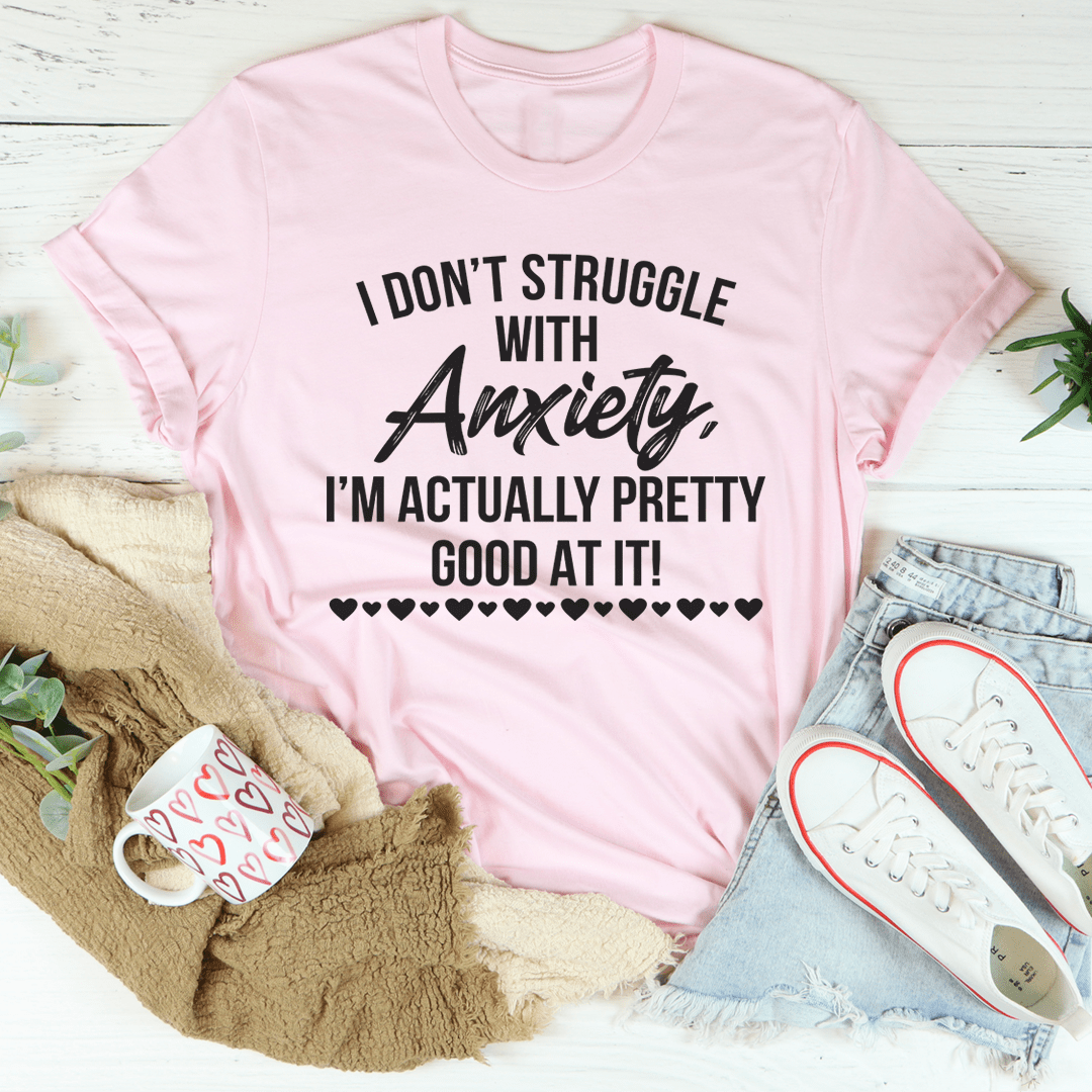 A comfortable I Don't Struggle With Anxiety Tee made from soft ring-spun cotton, featuring double stitching for durability and a meaningful printed message.