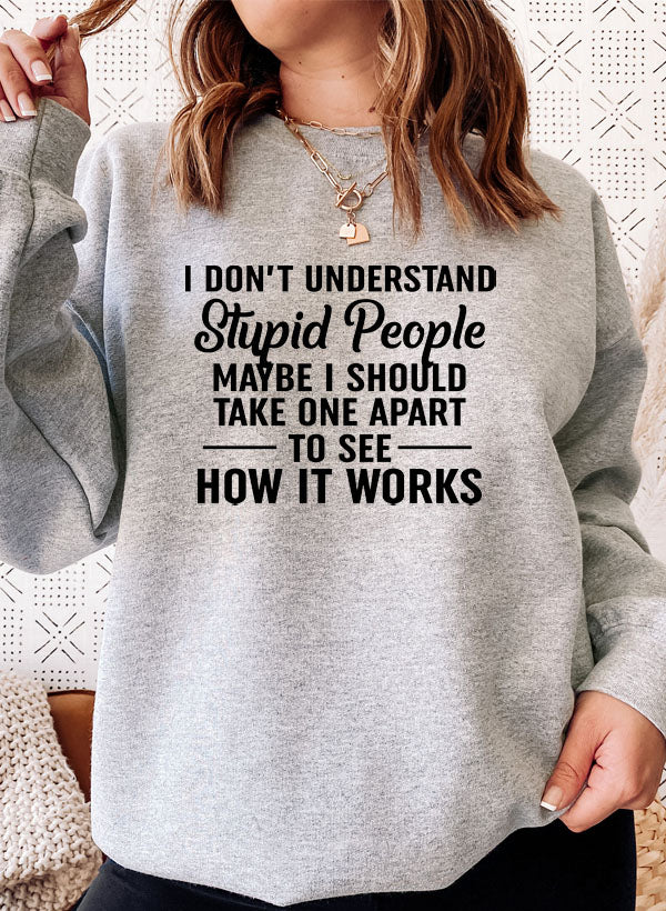 I Don't Understand Stupid People Sweat Shirt featuring a humorous design, made from soft cotton/poly fleece blend, perfect for casual wear.