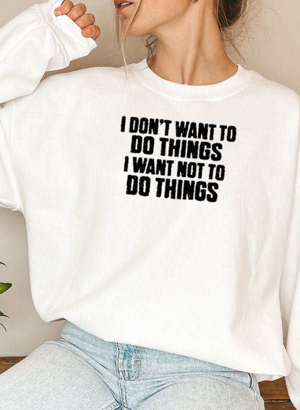 A cozy 'I Don't Want To Do Things' Sweat Shirt featuring a unique artistic design, made from a soft cotton/poly fleece blend.