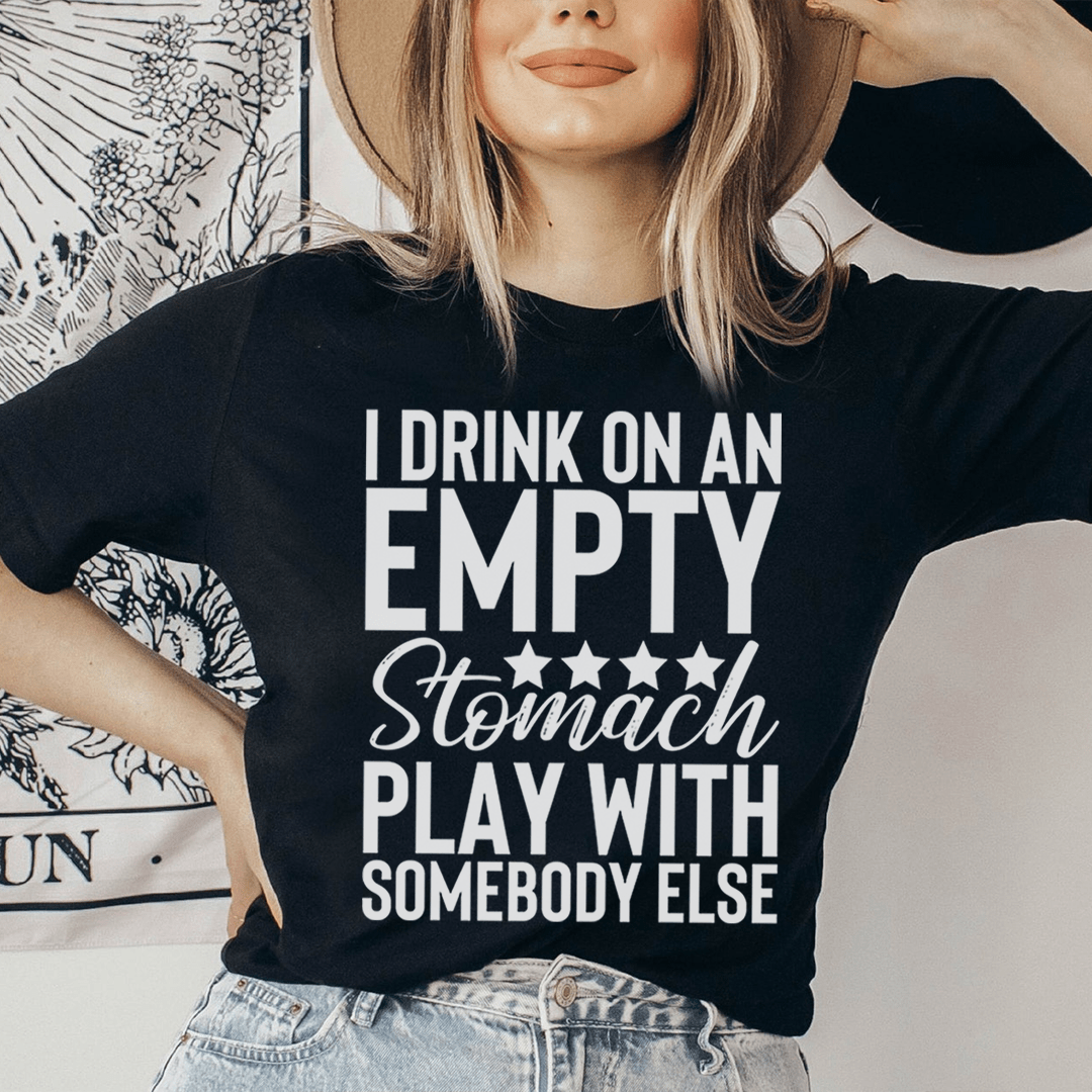 I Drink On An Empty Stomach Tee, a comfortable and durable t-shirt made from soft ring-spun cotton, featuring double stitching for added durability.