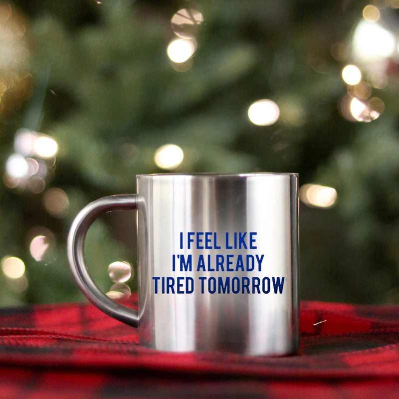 Ceramic mug with gold metallic coating featuring the phrase 'I Feel Like I'm Already Tired Tomorrow' in a stylish design.