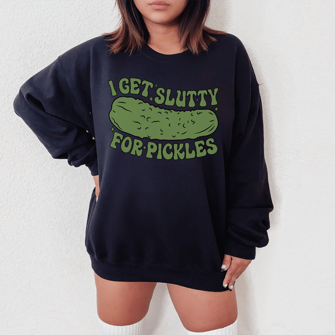 Cozy 'I Get Slutty For Pickles' sweatshirt featuring a playful pickle design, perfect for casual wear.