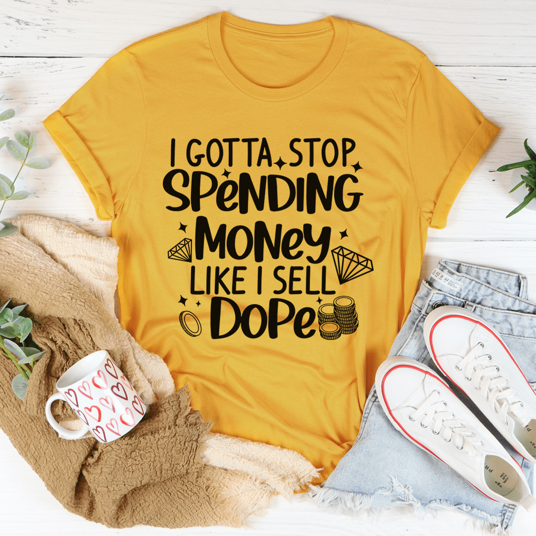 I Gotta Stop Spending Money Tee, a soft ring-spun cotton t-shirt with double stitching, available in various sizes.