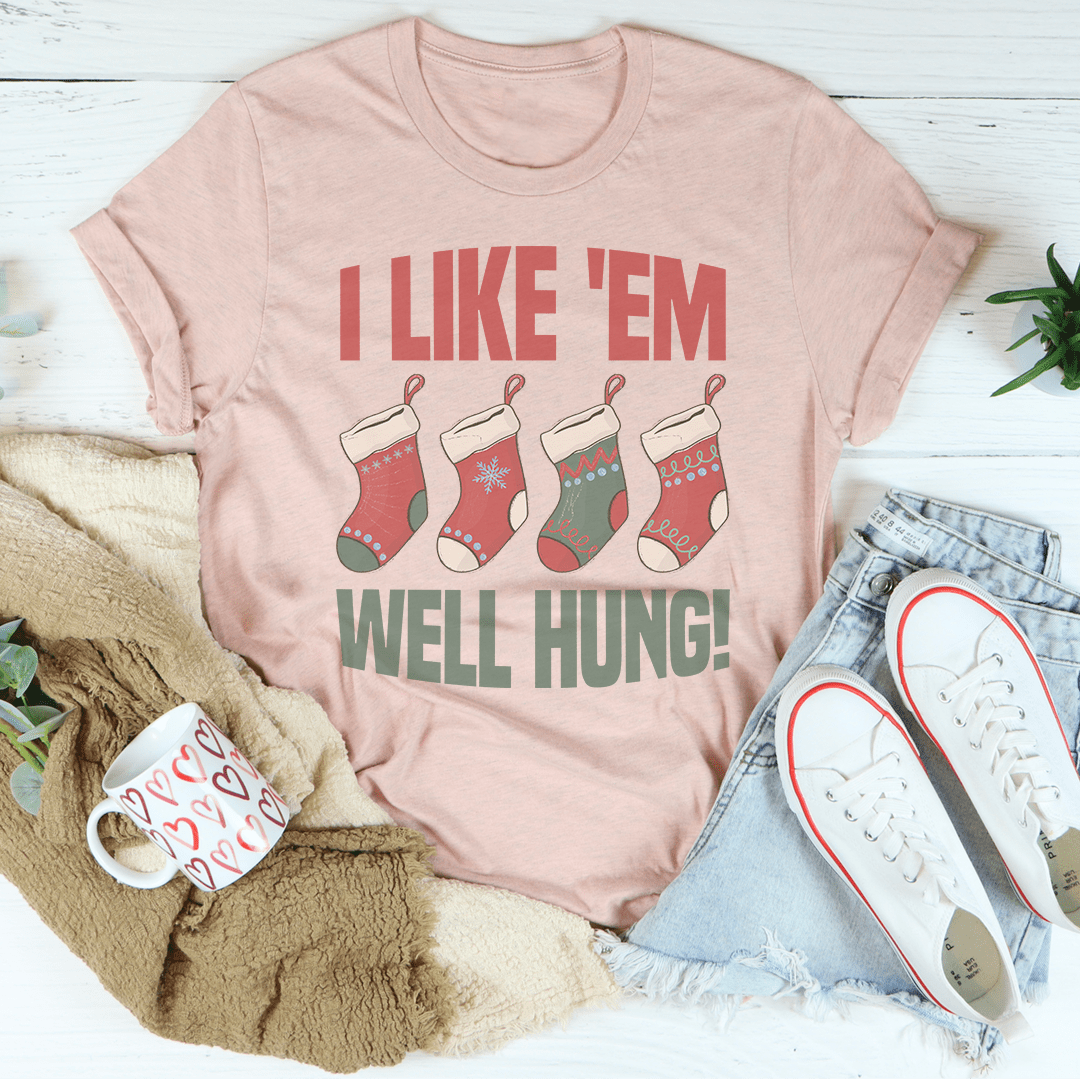 I Like 'Em Well Hung T-Shirt in various colors, showcasing its soft fabric and durable stitching.