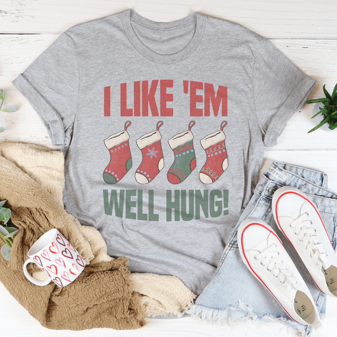 I Like 'Em Well Hung T-Shirt in various colors, showcasing its soft fabric and durable stitching.