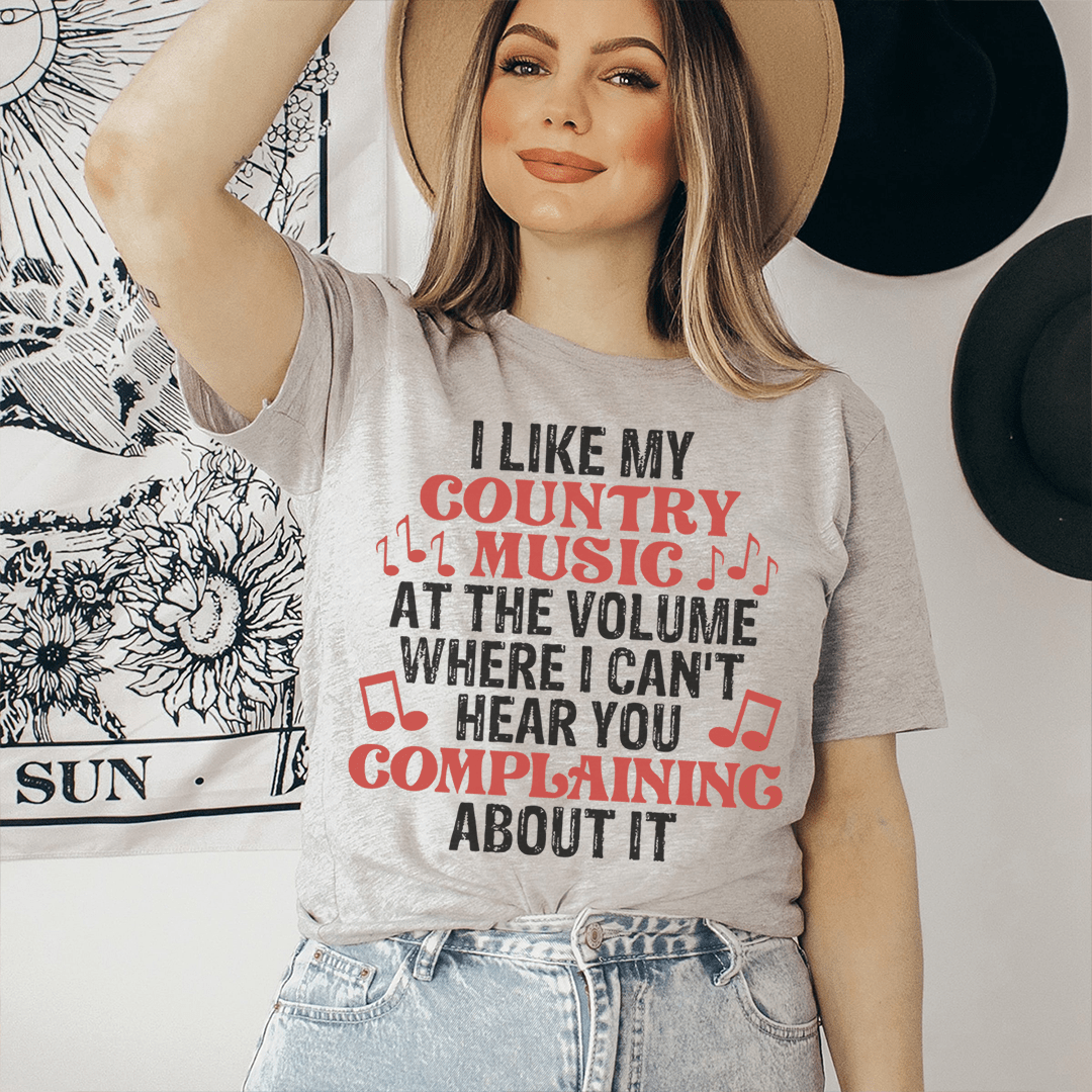 A comfortable and stylish t-shirt featuring the phrase 'I Like My Country Music At The Volume Where I Can't Hear You', made from soft ring-spun cotton.