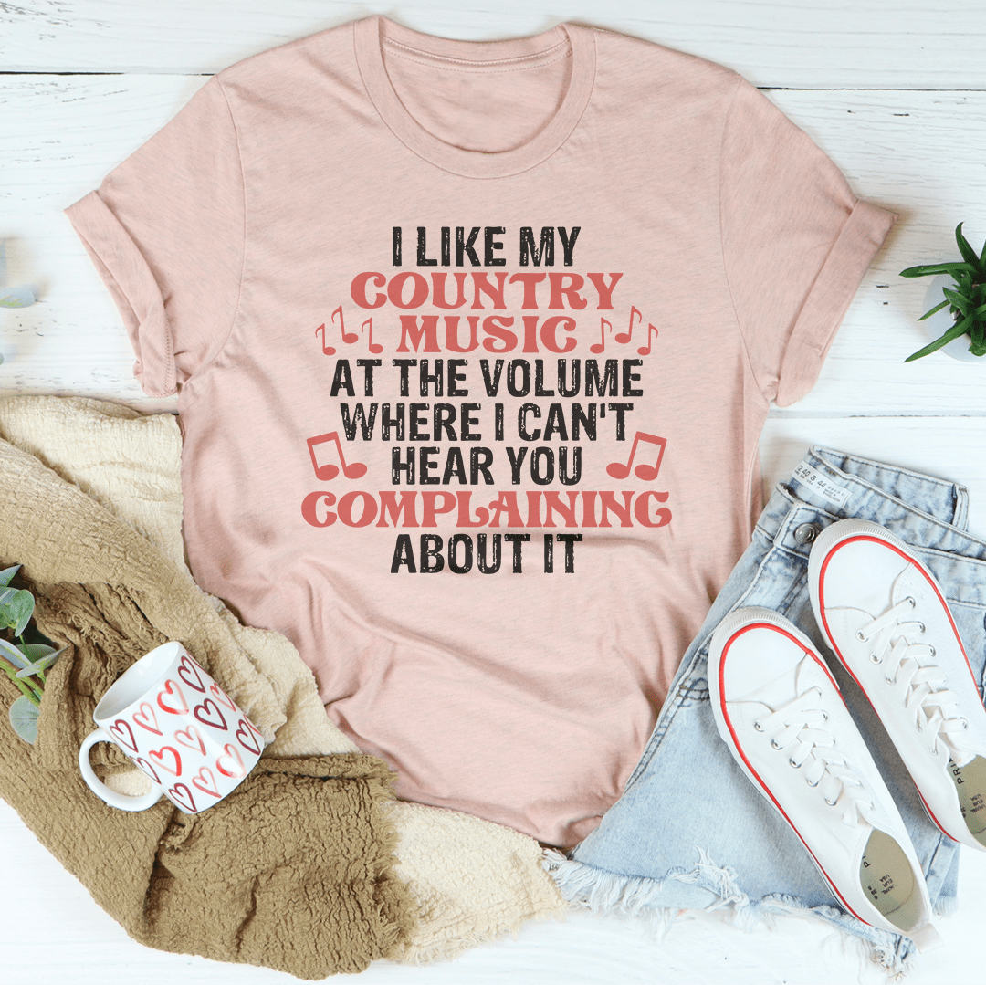 A comfortable and stylish t-shirt featuring the phrase 'I Like My Country Music At The Volume Where I Can't Hear You', made from soft ring-spun cotton.