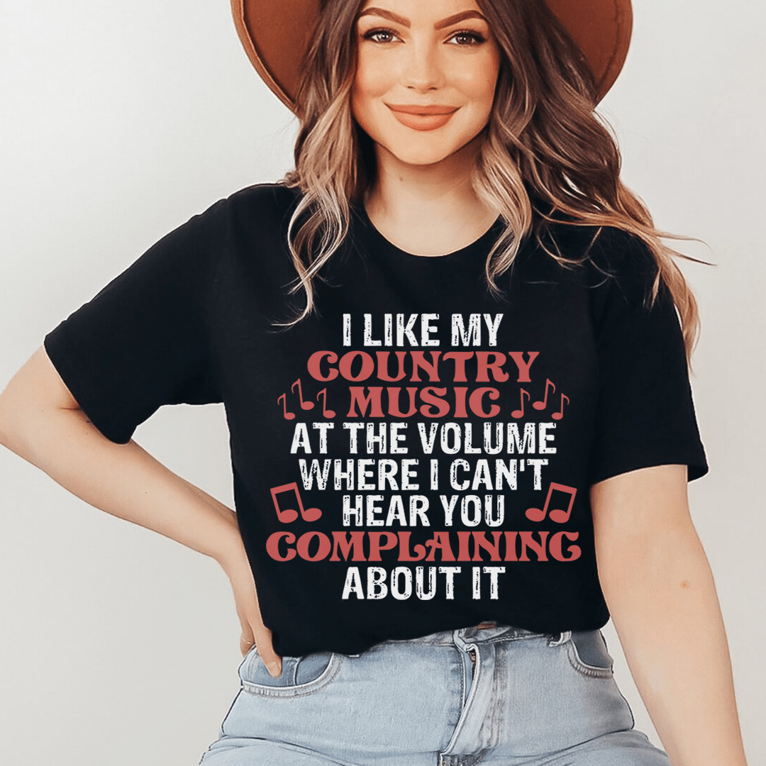 A comfortable and stylish t-shirt featuring the phrase 'I Like My Country Music At The Volume Where I Can't Hear You', made from soft ring-spun cotton.