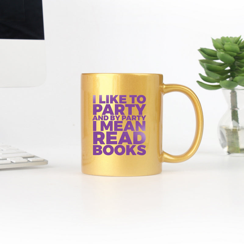 Ceramic mug with gold and silver design featuring the phrase 'I Like To Party Read Books', perfect for book lovers.