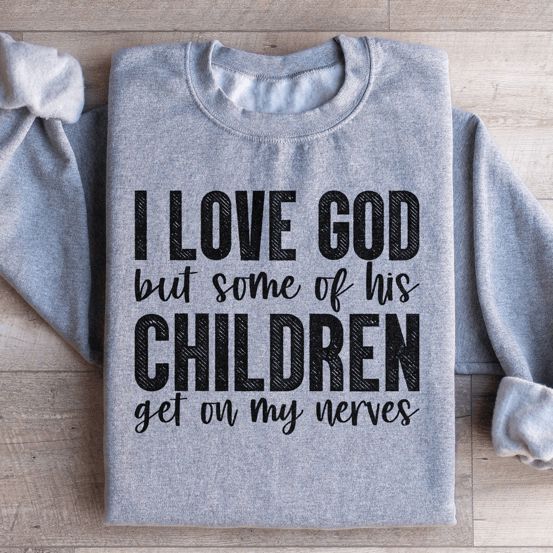 Cozy sweatshirt featuring the phrase 'I Love God But Some Of His Children', designed by top artists, showcasing a stylish and comfortable fit.