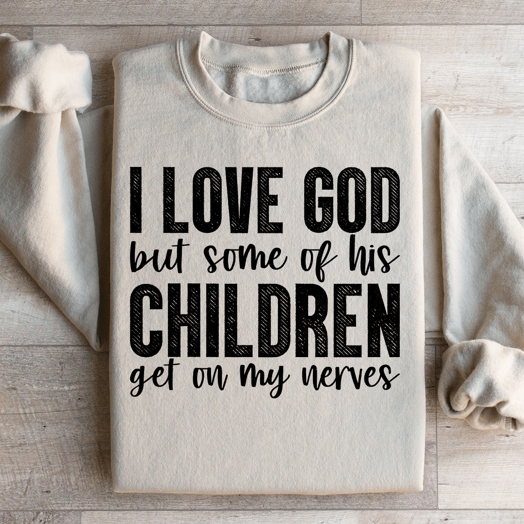 Cozy sweatshirt featuring the phrase 'I Love God But Some Of His Children', designed by top artists, showcasing a stylish and comfortable fit.