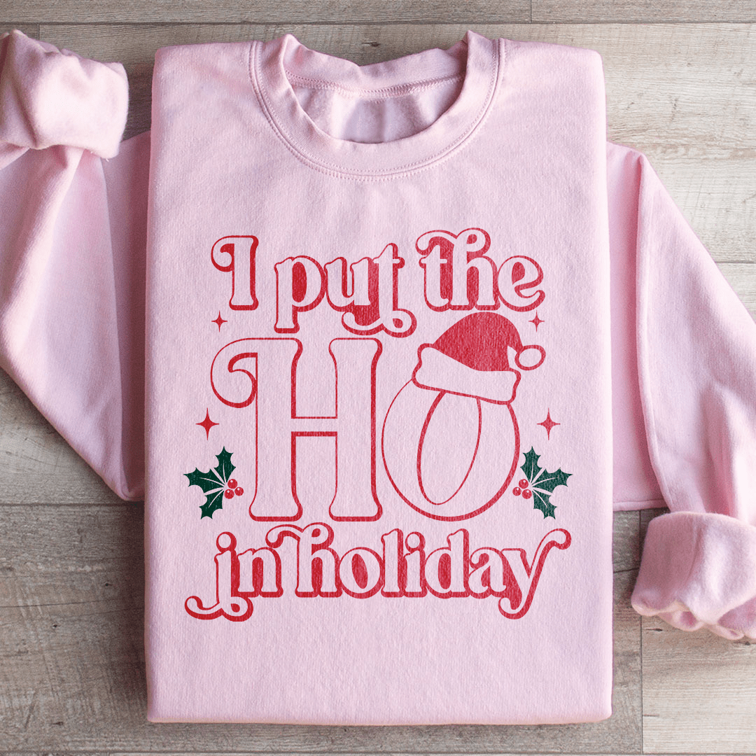 Cozy 'I Put The HO In Holiday' sweats featuring unique designs by top artists, made from warm cotton/poly fleece blend.