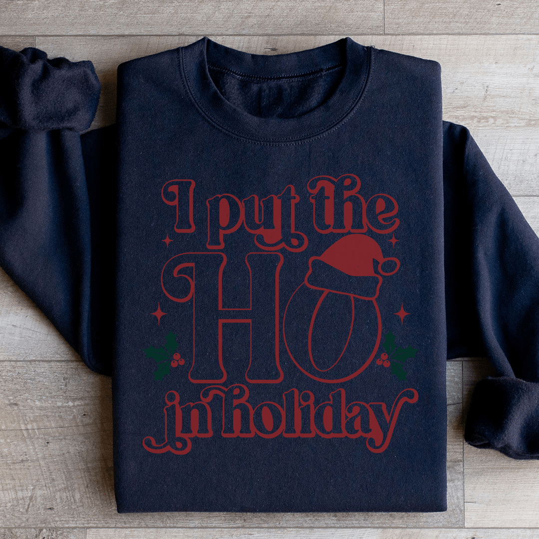 Cozy 'I Put The HO In Holiday' sweats featuring unique designs by top artists, made from warm cotton/poly fleece blend.