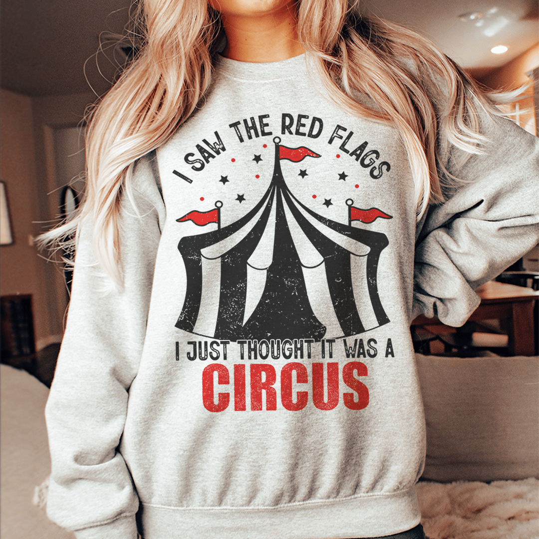 I Saw The Red Flags hoodie featuring unique artistic designs, made from a cozy cotton/poly fleece blend with adjustable cuffs.