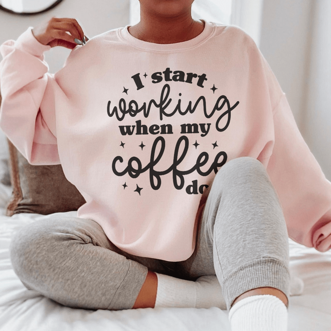 Cozy 'I Start Working When My Coffee Does' sweats featuring a cotton/poly fleece blend and adjustable cuffs.