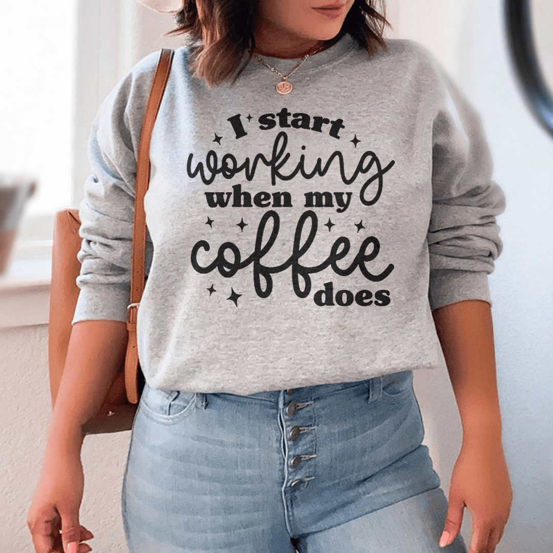 Cozy 'I Start Working When My Coffee Does' sweats featuring a cotton/poly fleece blend and adjustable cuffs.