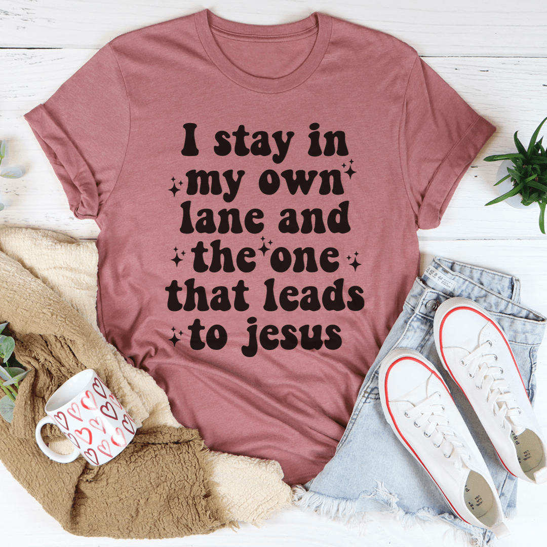 I Stay In My Own Lane Tee made of soft ring-spun cotton, featuring double stitching for durability, available in various sizes.