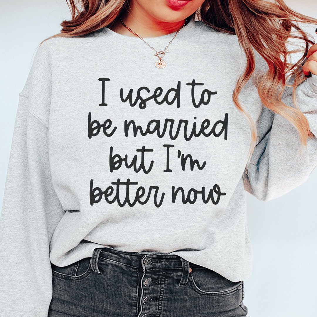 Cozy 'I Used To Be Married But I'm Better Now' sweats featuring a unique design by top artists, made from a soft cotton/poly fleece blend.