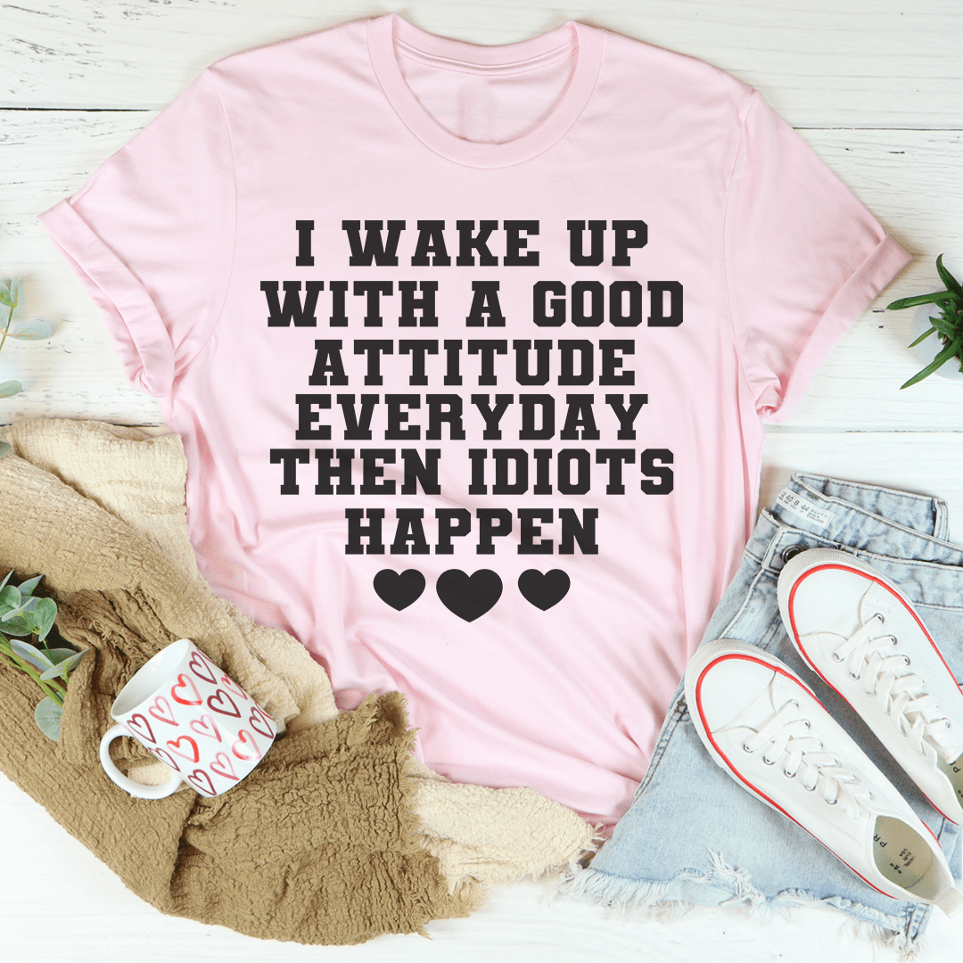 A comfortable I Wake Up With A Good Attitude Everyday Tee in soft ring-spun cotton, featuring a positive message printed on the front.