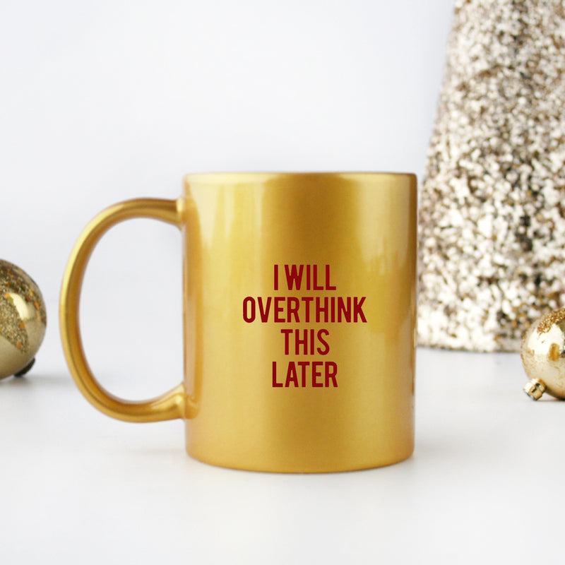 Ceramic mug with gold and silver design featuring the phrase 'I Will Overthink This Later'.