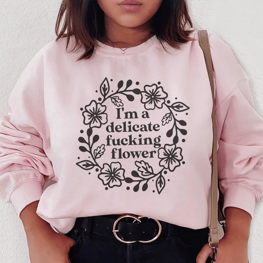 I'm A Delicate Flower sweatshirt featuring a cozy fleece lining and adjustable cuffs, designed by top artists for unique style.