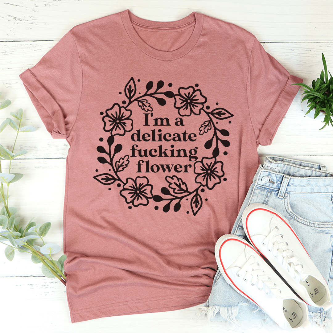 I'm A Delicate Flower T-Shirt in various colors, showcasing its soft cotton fabric and durable stitching.