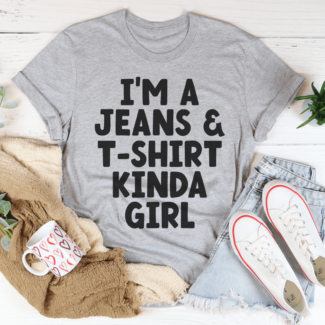 A stylish and comfortable 'I'm A Jeans & Tee Kinda Girl Tee' made from soft ring-spun cotton, featuring double stitching for durability.