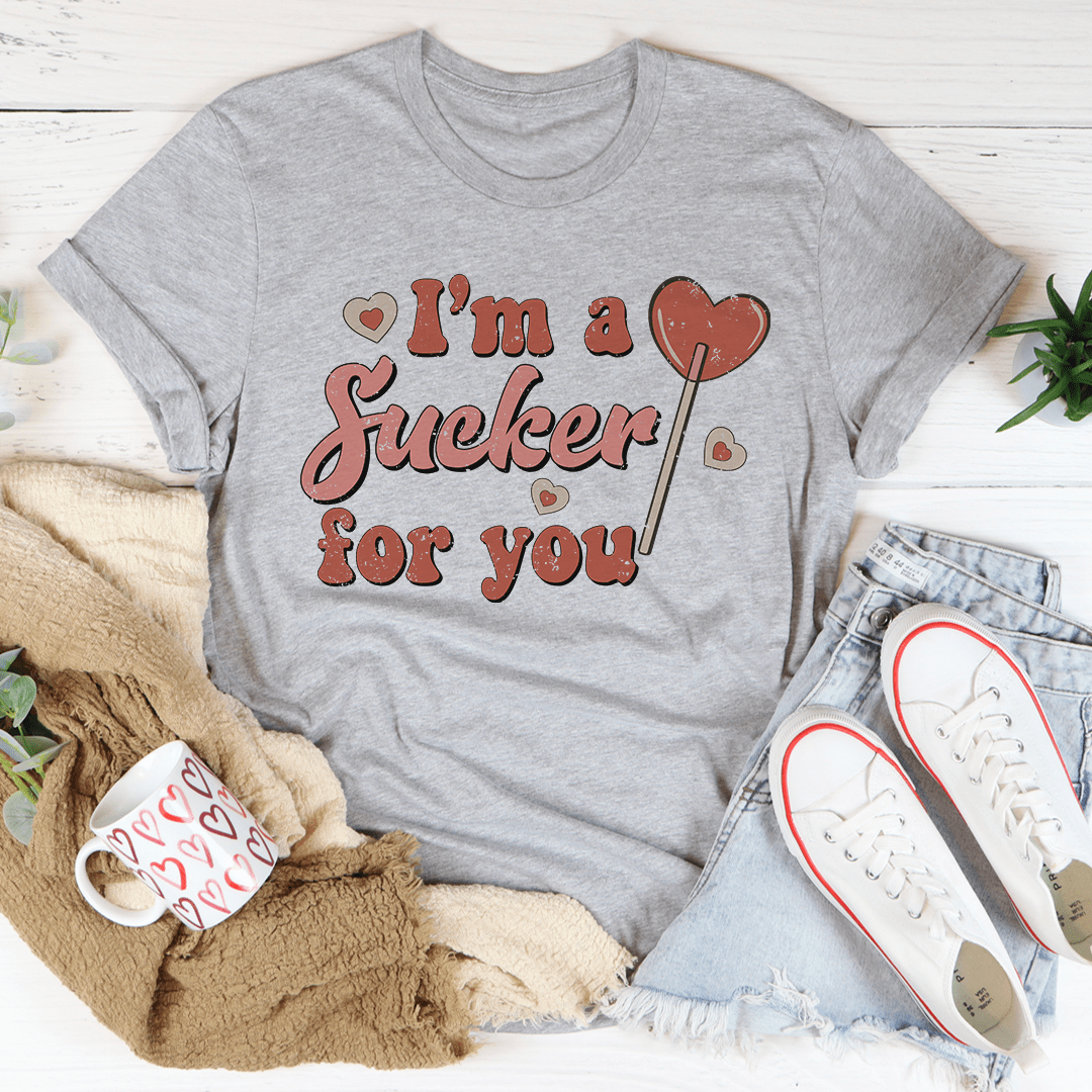 A stylish 'I'm A Sucker For You' T-Shirt made from soft ring-spun cotton, featuring double stitching for durability and vibrant DTG printed design.