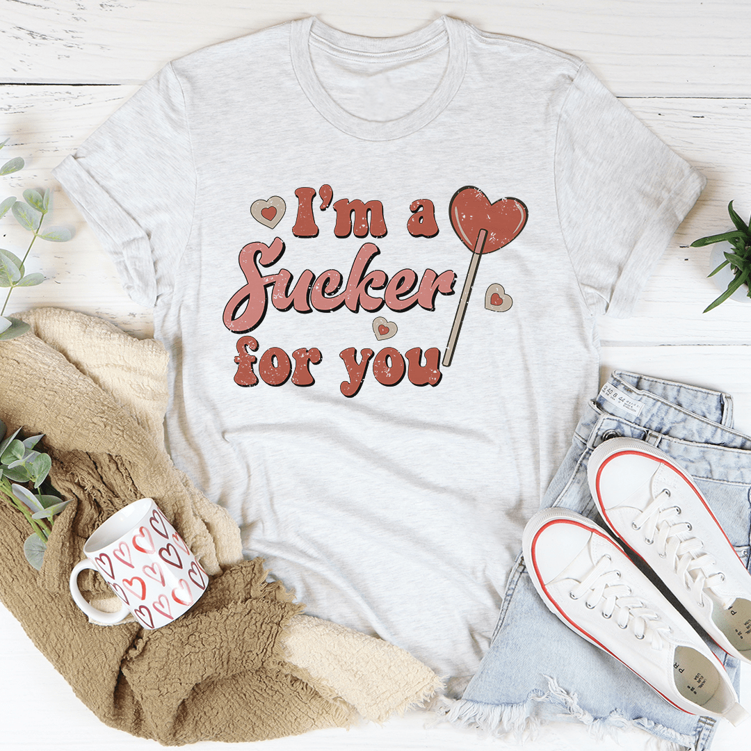 A stylish 'I'm A Sucker For You' T-Shirt made from soft ring-spun cotton, featuring double stitching for durability and vibrant DTG printed design.