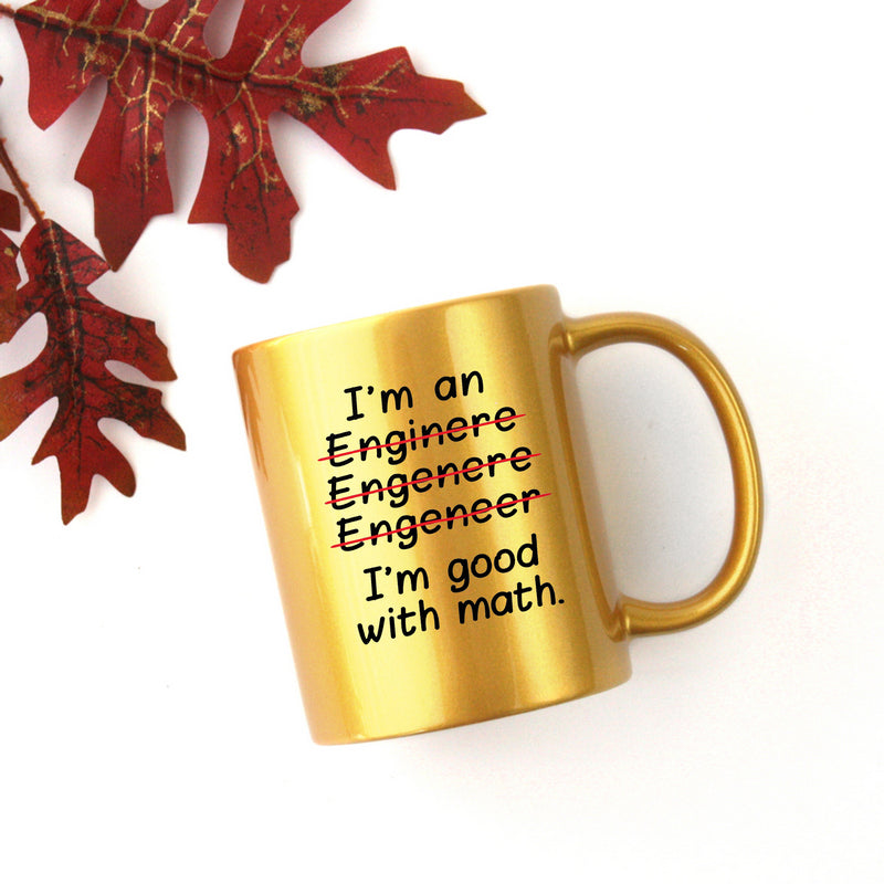 Ceramic mug with gold metallic coating featuring the phrase 'Im An Engineer Im Good At Math' designed for engineers and math lovers.