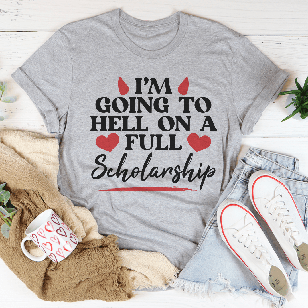 I'm Going To Hell In A Full Scholarship Tee, featuring a playful design on a soft, durable cotton fabric.