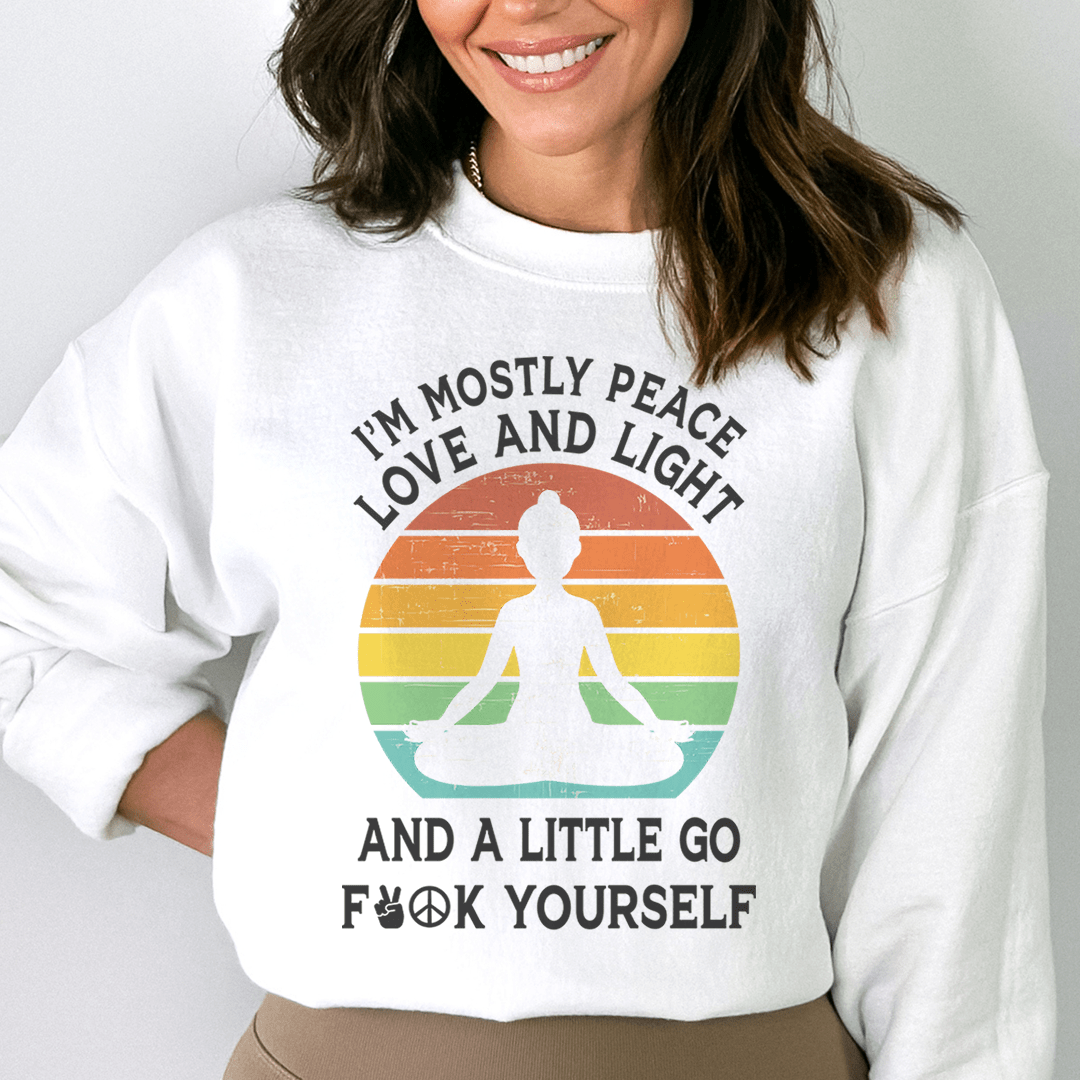 A cozy hoodie featuring the phrase 'I'm Mostly Peace Love And Light' designed by top artists, showcasing vibrant colors and a comfortable fit.