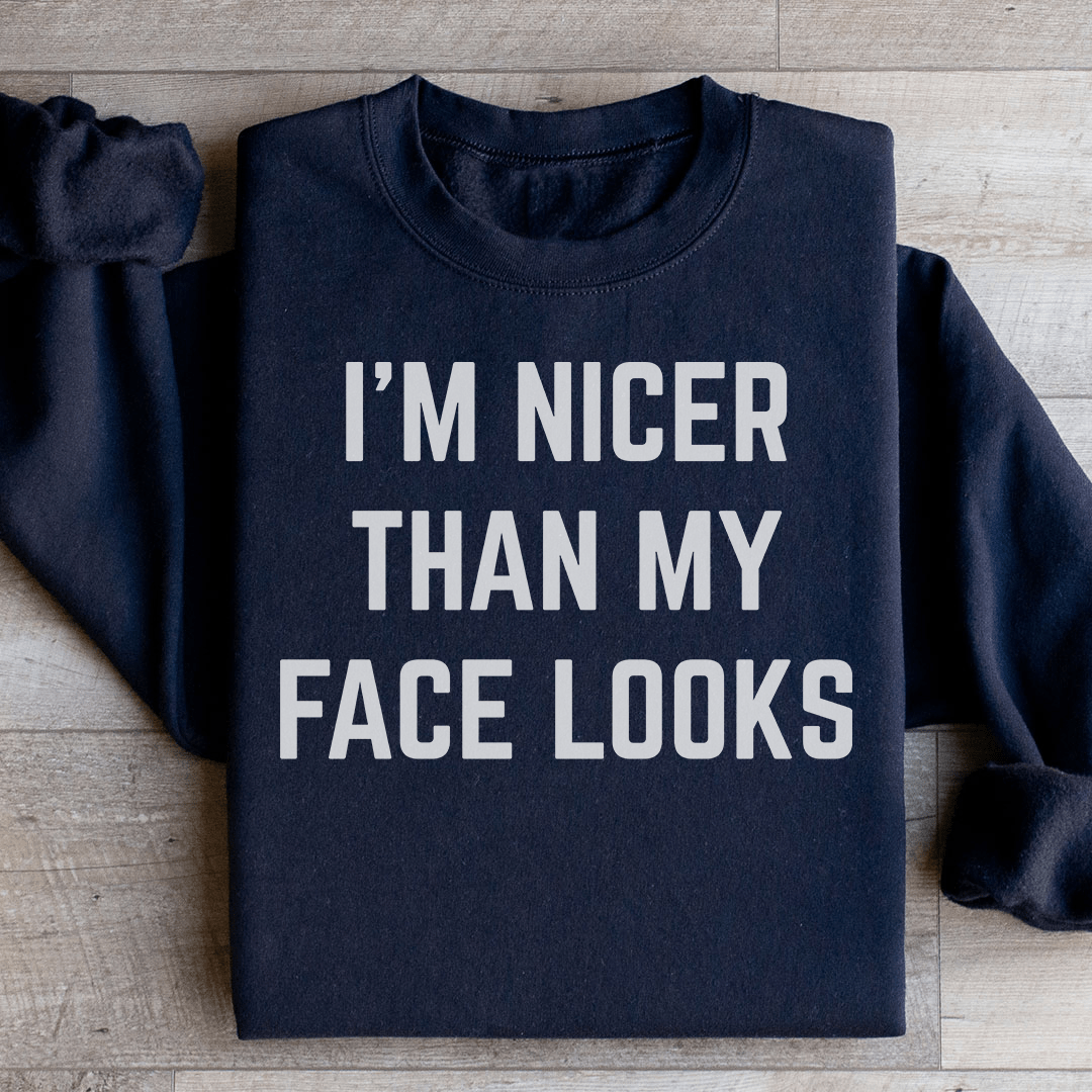 Cozy 'I'm Nicer Than My Face Looks' sweats featuring unique designs by top artists, made from soft cotton/poly fleece blend.