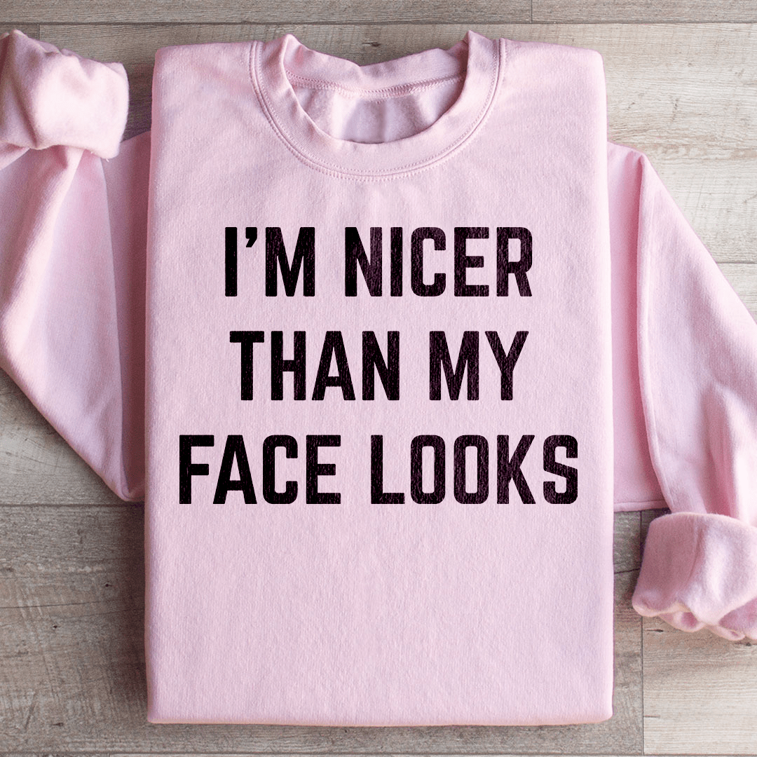 Cozy 'I'm Nicer Than My Face Looks' sweats featuring unique designs by top artists, made from soft cotton/poly fleece blend.