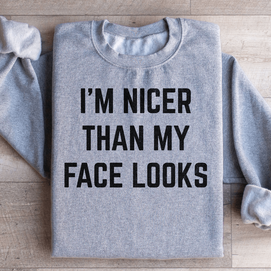 Cozy 'I'm Nicer Than My Face Looks' sweats featuring unique designs by top artists, made from soft cotton/poly fleece blend.