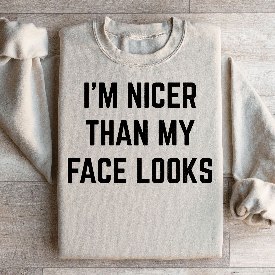 Cozy 'I'm Nicer Than My Face Looks' sweats featuring unique designs by top artists, made from soft cotton/poly fleece blend.