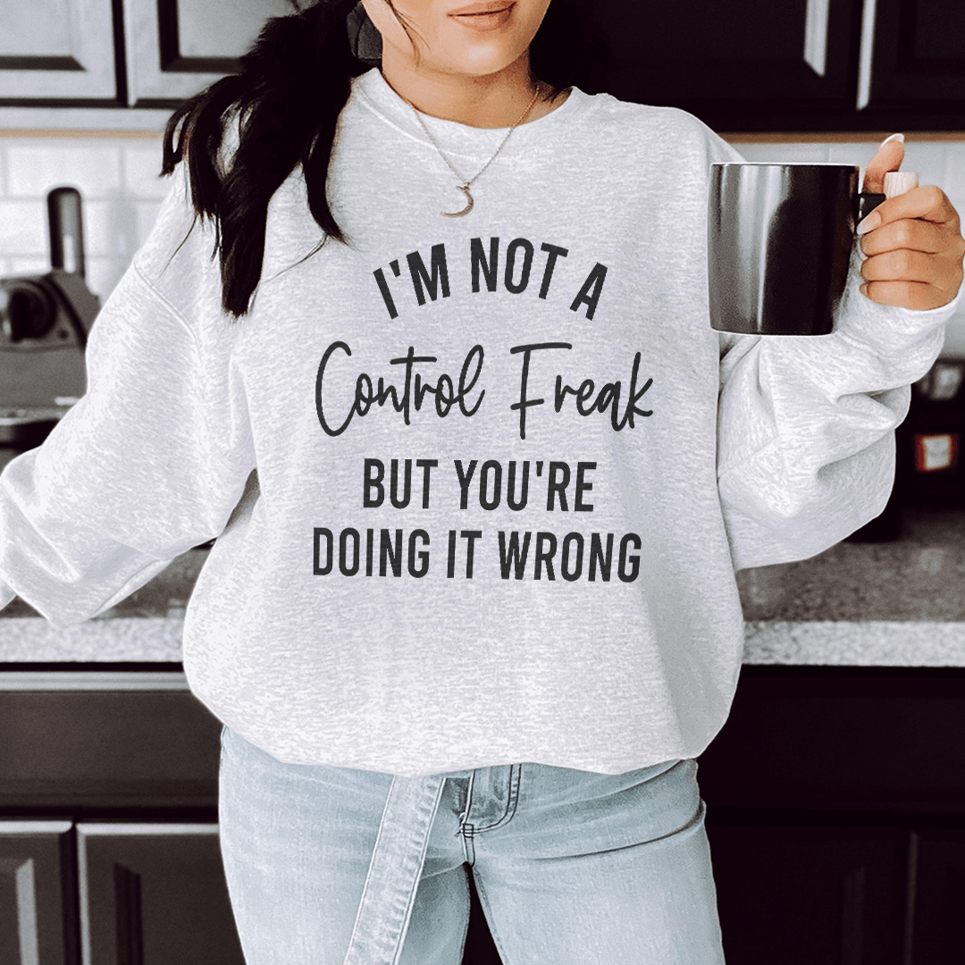 Cozy 'I'm Not A Control Freak' sweats featuring unique designs by top artists, made from a warm cotton/poly fleece blend.