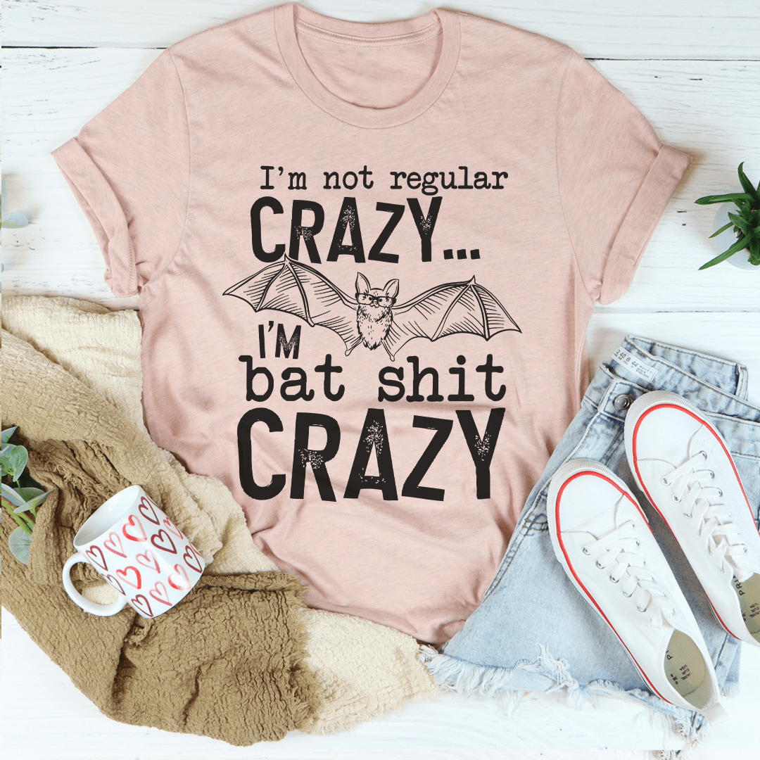 I'm Not Regular Crazy Tee in various colors, showcasing its soft cotton fabric and durable stitching.