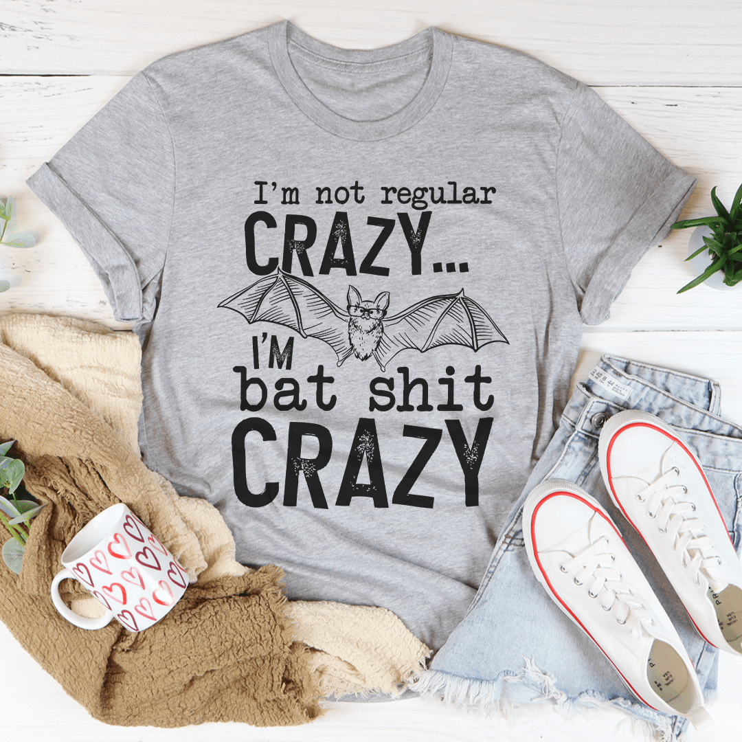 I'm Not Regular Crazy Tee in various colors, showcasing its soft cotton fabric and durable stitching.