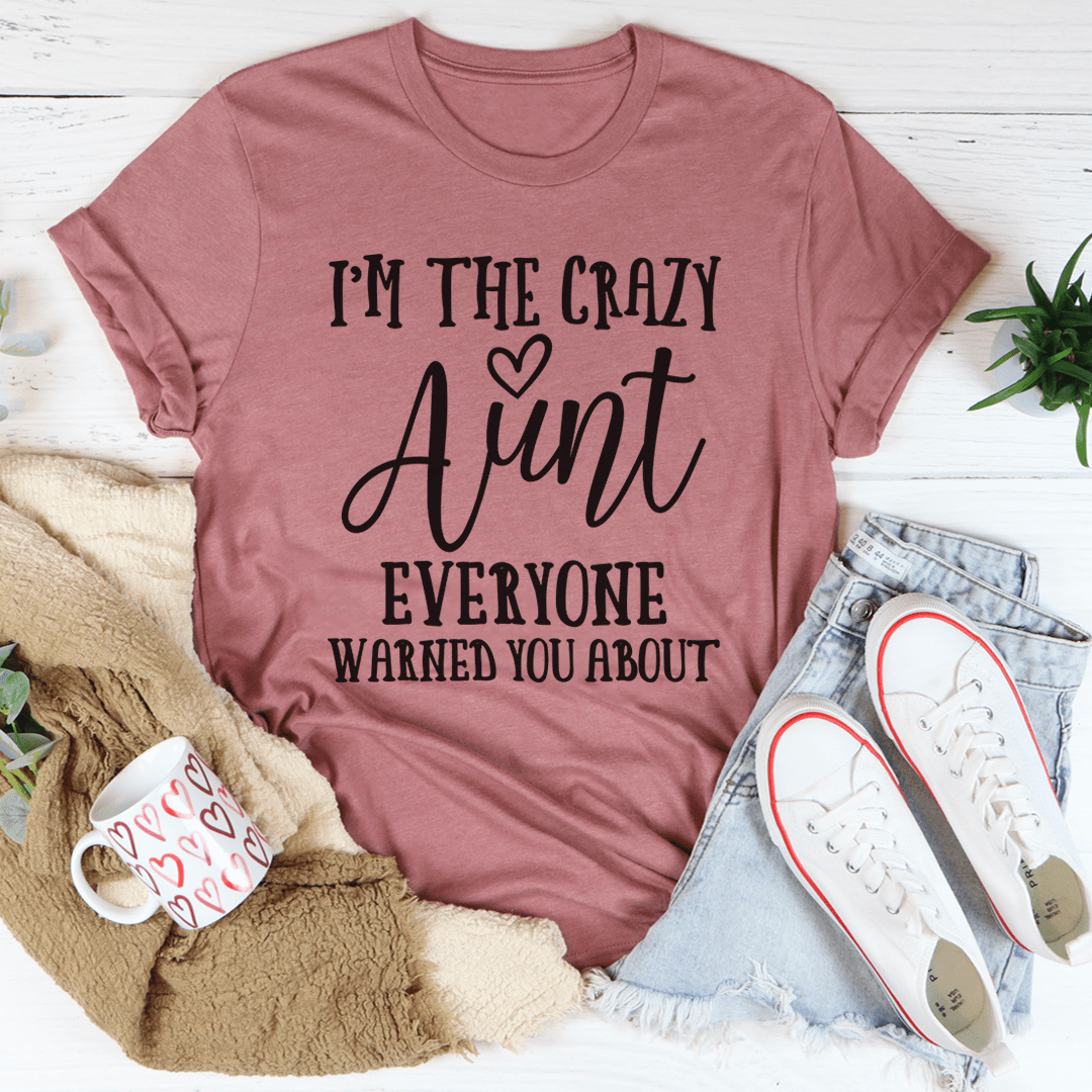 I'm The Crazy Aunt Tee, a soft cotton t-shirt with a playful design, showcasing durability and comfort.