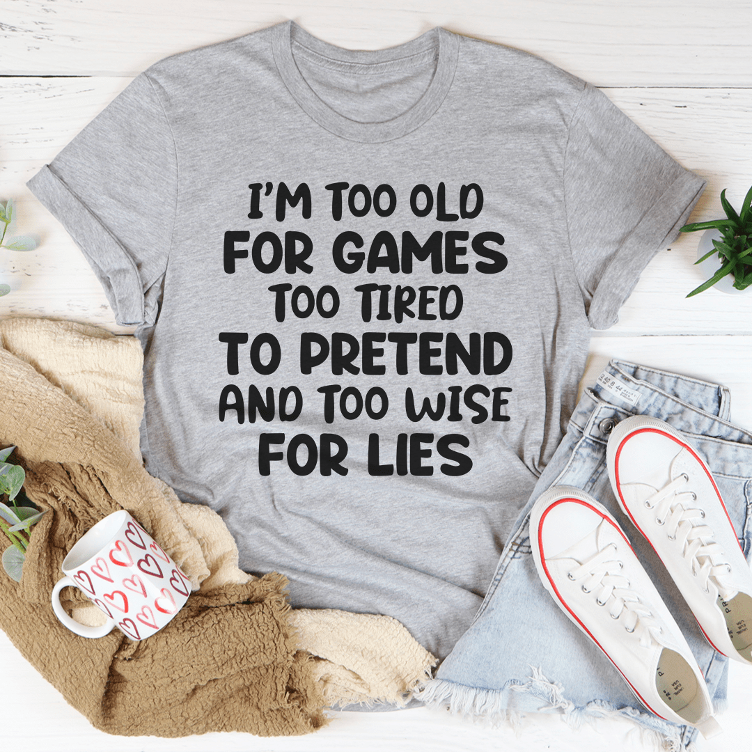 A comfortable and stylish 'I'm Too Old For Games Tee' made from soft ring-spun cotton, featuring a playful slogan.