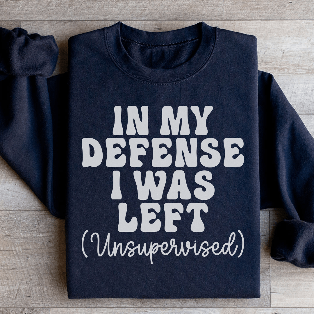 Cozy 'In My Defense I Was Left Unsupervised' sweats featuring a unique design by top artists, made from a warm cotton/poly fleece blend.