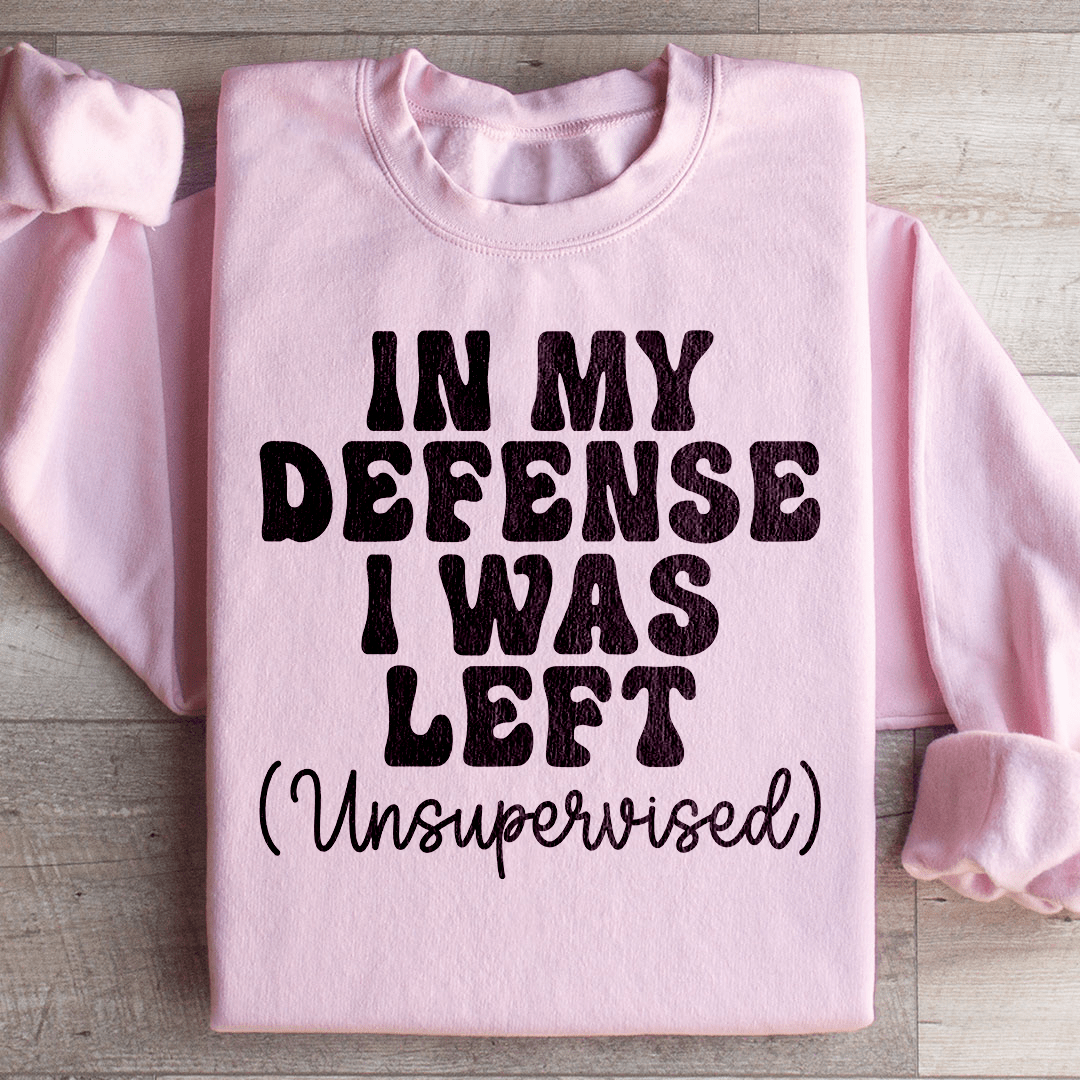 Cozy 'In My Defense I Was Left Unsupervised' sweats featuring a unique design by top artists, made from a warm cotton/poly fleece blend.