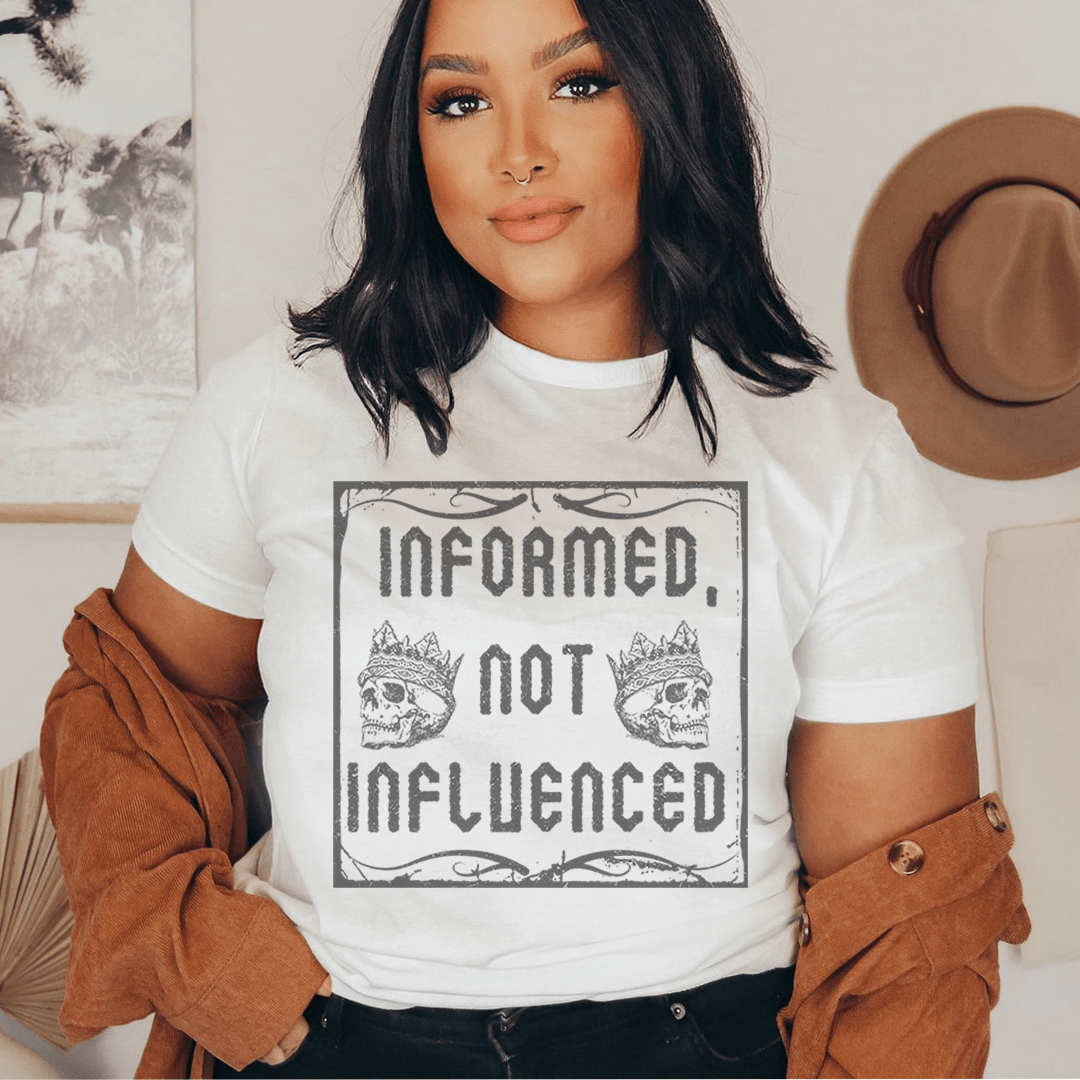 Informed Not Influenced Tee displayed on a mannequin, showcasing its soft cotton fabric and stylish design.