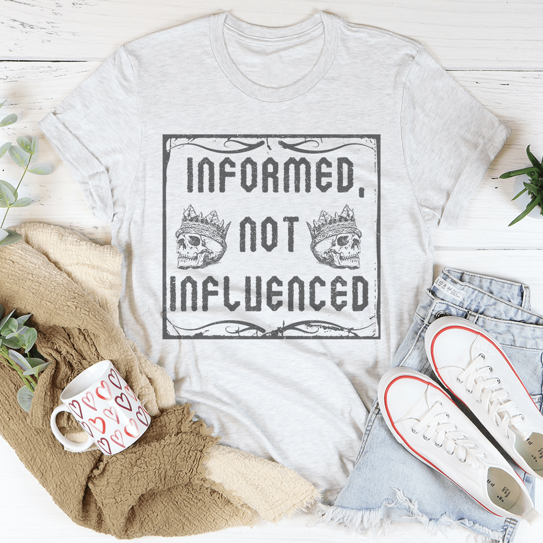 Informed Not Influenced Tee displayed on a mannequin, showcasing its soft cotton fabric and stylish design.