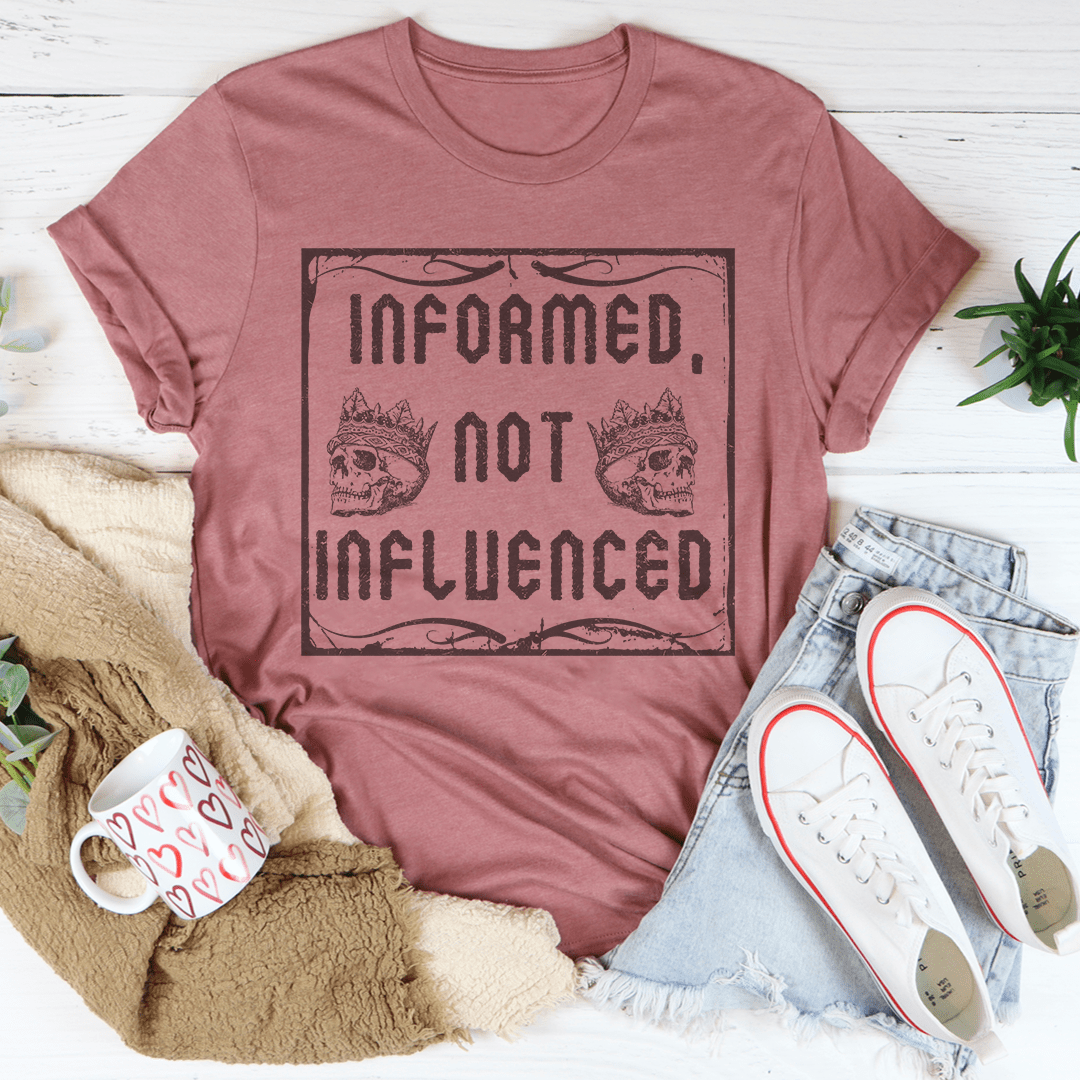 Informed Not Influenced Tee displayed on a mannequin, showcasing its soft cotton fabric and stylish design.